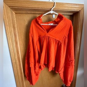 Coral, size medium, oversized long sleeve top.